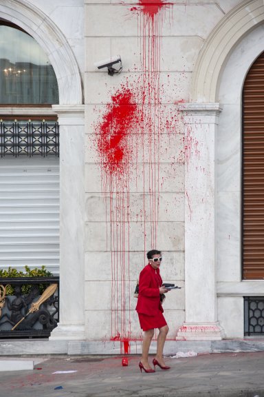 Woman in red © Camille Bessard