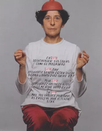 photo of Esther Ferrer with a suction cup on her head