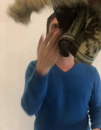 photo of a dancer throwing a carpet