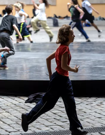 Dancers running outdoors at Les Subs in Lyon