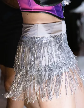 A closer look at a silver sequinned skirt