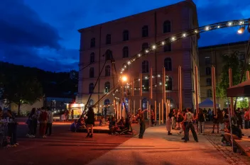 photo of a party in the courtyard at Les Subs