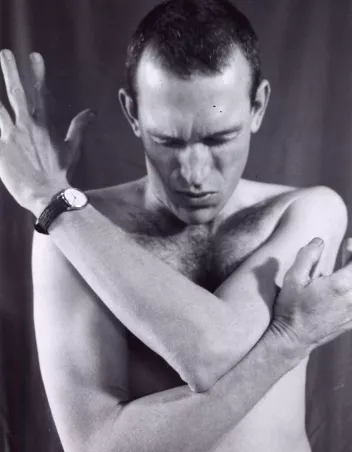 Black-and-white portrait of Mark Tompkins